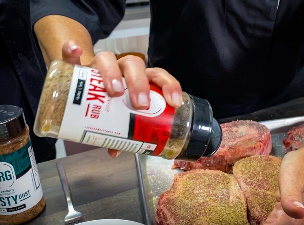 Photo of Prep as usual for grilling steaks. Bring to room temperature and season. We layered Boars Night Out – White Lightning as a base, Lisa’s World Championship Steak Rub next and a dusting of Rusty Dust- one of Russell’s seasonings.
